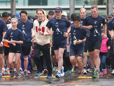 President, Canadian MPs brave rain to join Terry Fox charity run