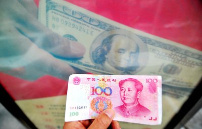Asian currencies down after depreciation in Chinese RMB