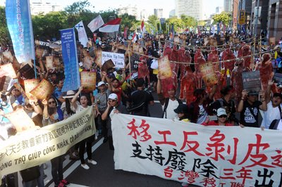 Migrant workers, groups take to streets in protest