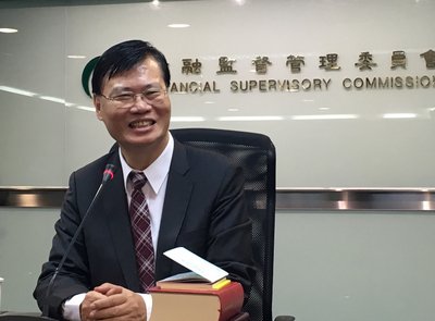FSC chief resigns over handling of bank scandal