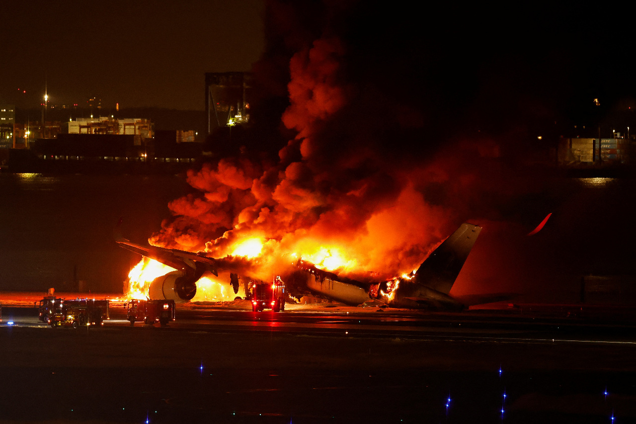 All passengers and crew on Japan Airlines flight safe after collision at Tokyo airport